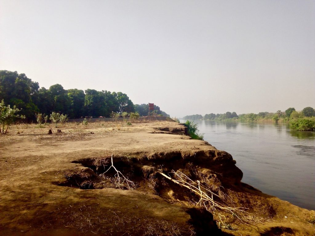 A concrete perimetre wall that stretches into the River Nile waters. 1