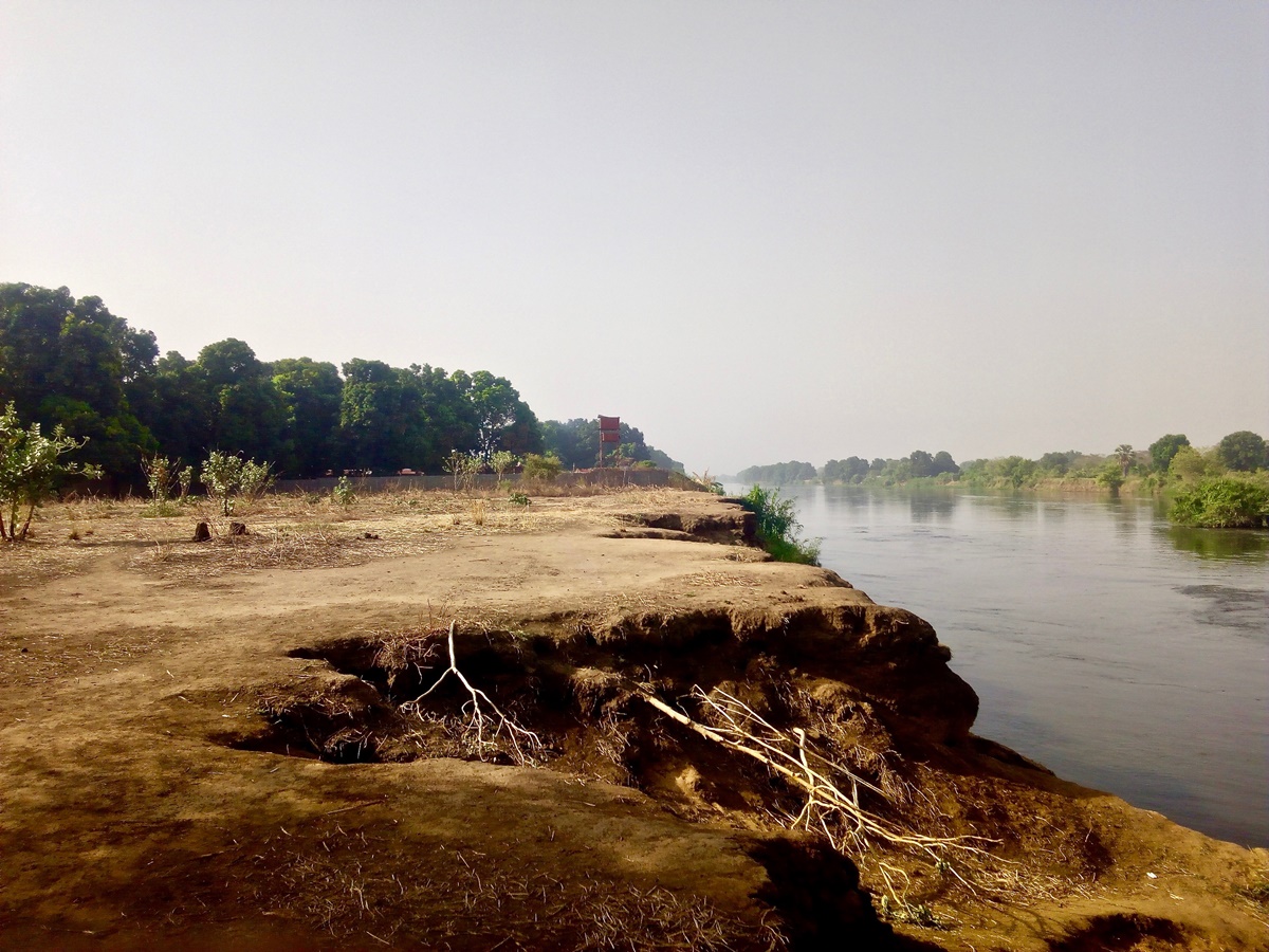 A concrete perimetre wall that stretches into the River Nile waters. 1