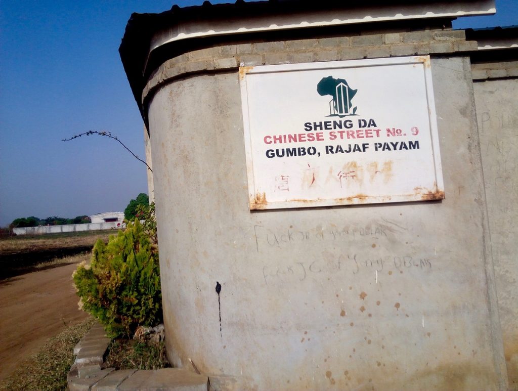 The sign post of Sgeng DA firm on Chinese Street No 9 on the Gumbo Rajaf Paym road. 1