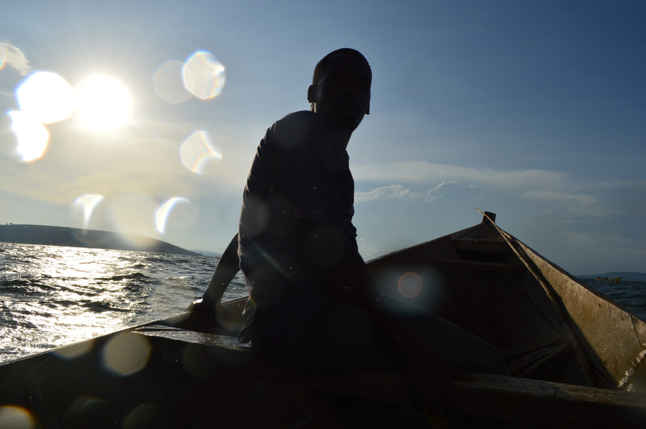 Copy of boat heading back to walumbe village scaled