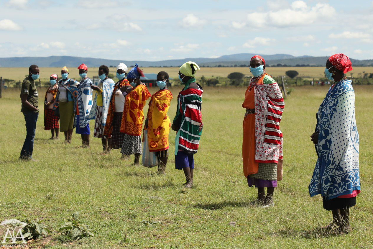Some of the Maa Beadwork women queuing for the food that was donated by Sidekick Foundation during COVID-19. (Photo courtesy The Maa Trust)