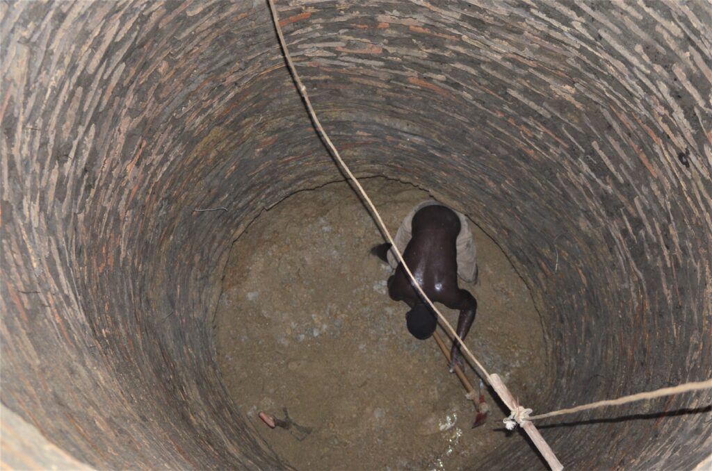 A man in Isingiro district digs a shall well. Groundwater is accessed through several ways including dug wells Photo by Fredrick Mugira
