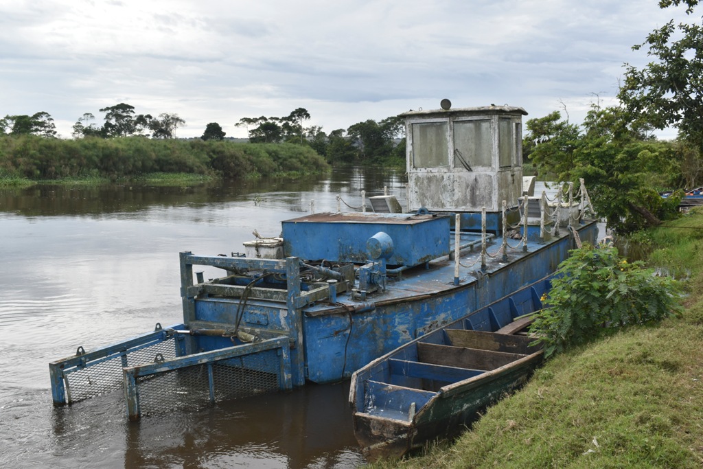 Idle water weed excavation boat on Kagera river bank. Photo by Davis Buyondo 12