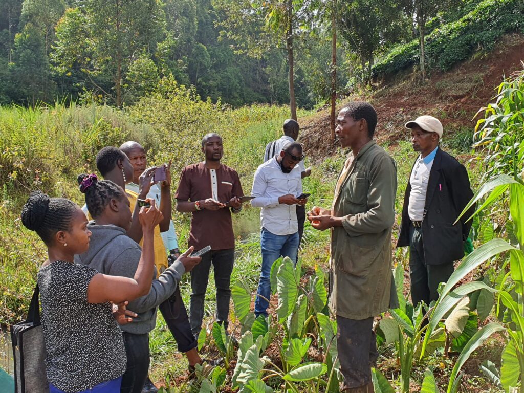 David maina with journalists