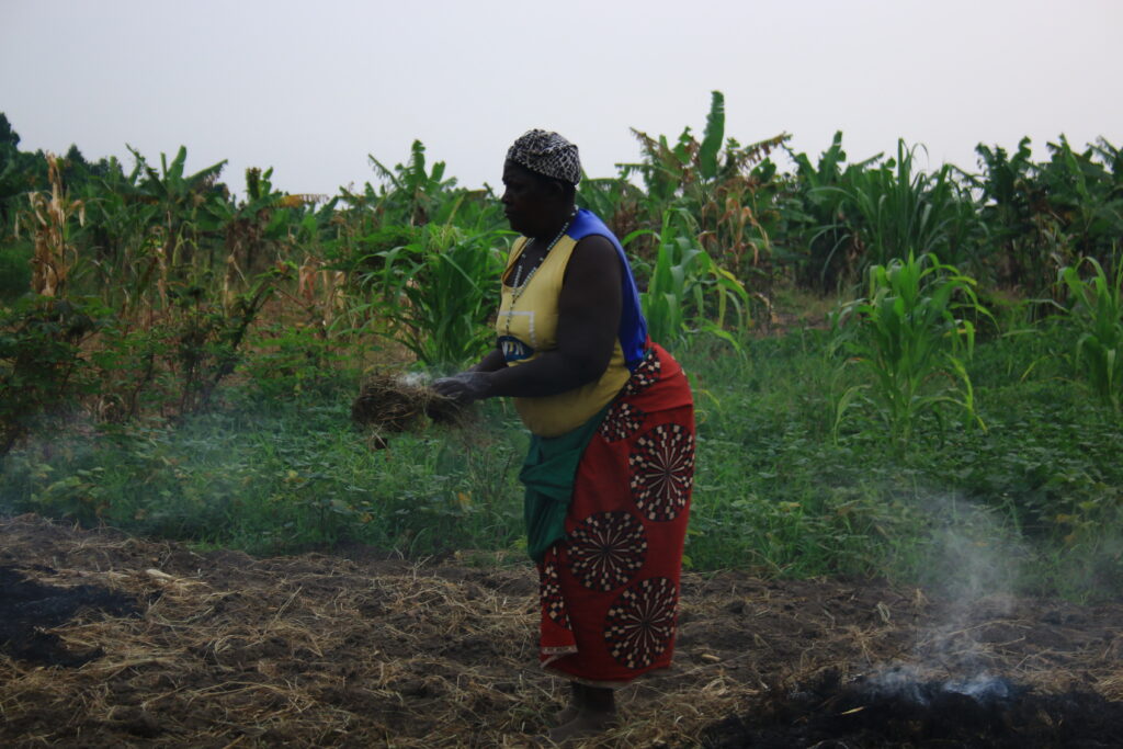 Fausta Ngabirano is ploughing her garden in Nyamwamba Valley in Kasese Municipality 3 1
