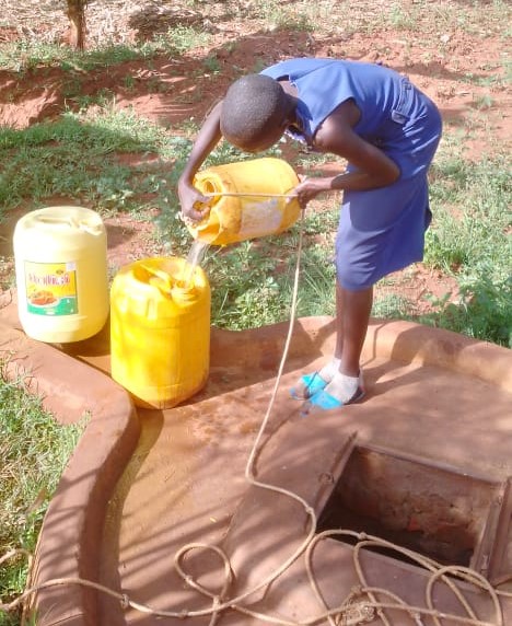 girl fetching water 2