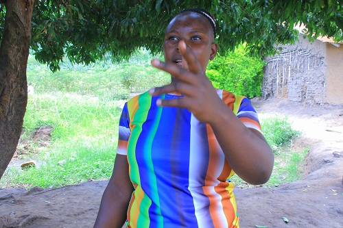Kasfa Fraha Cocoa Business Woman at Burondo Trading Center in Burondo Sub County Bundibugyo Distirtc 5