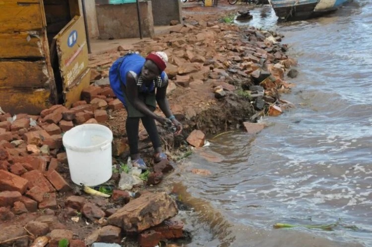 woman washing at Jinja