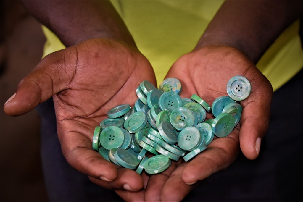 Buttons made out of plastics collected from communities and Lake victoria