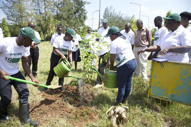 Kibos residents planting trees at River Kibos
