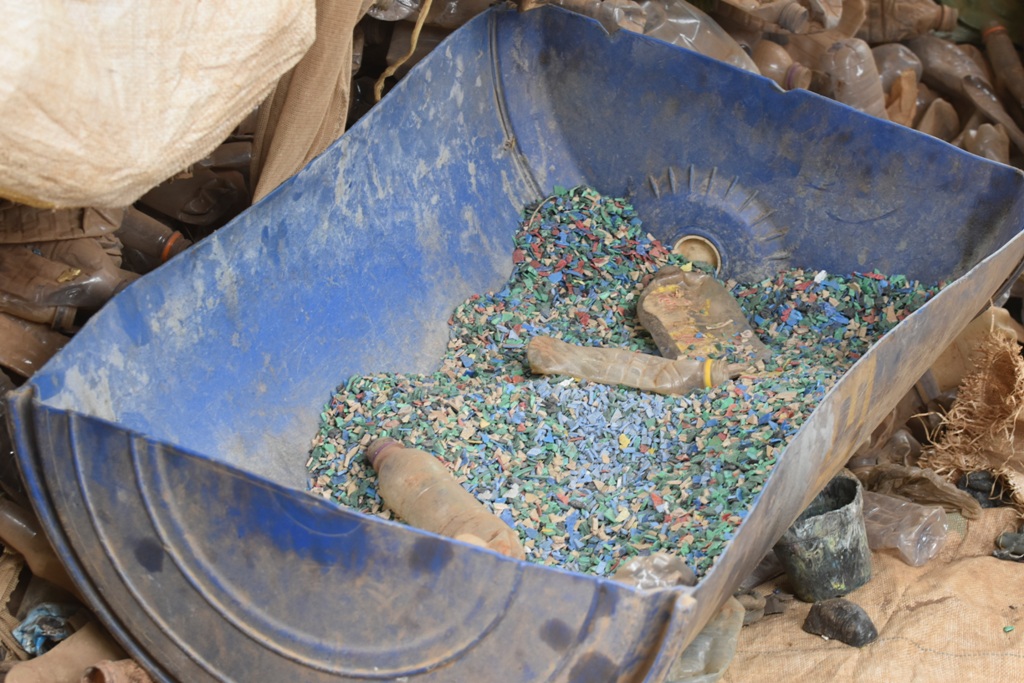 Plastic shreds at Ecobrix site to be used for production of plastic tiles